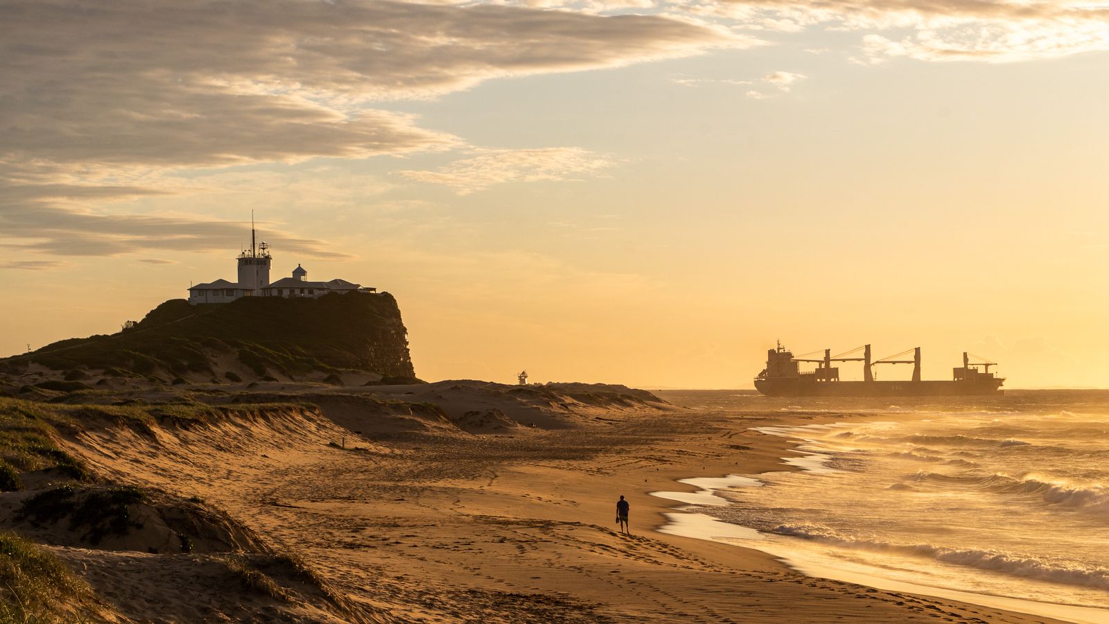 Nobbys Beach and lighthouse at sunset, Newcastle